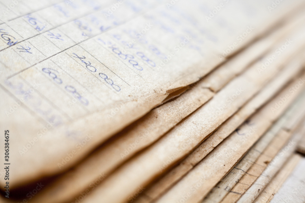 Naklejka premium Old paper documents in the archive