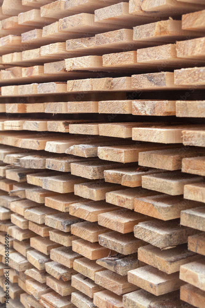 Wooden planks. Air-drying timber stack. Wooden planks. Air-drying timber stack.