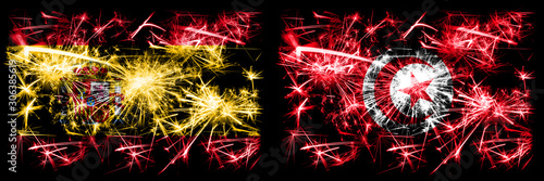 Spanish vs Tunisia, Tunisian New Year celebration sparkling fireworks flags concept background. Combination of two abstract states flags. © Vlad