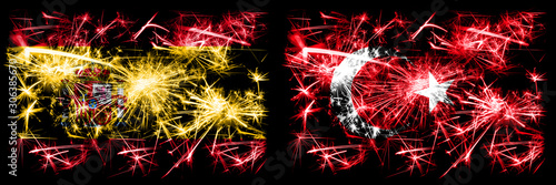 Spanish vs Turkey, Turkish New Year celebration sparkling fireworks flags concept background. Combination of two abstract states flags. © Vlad