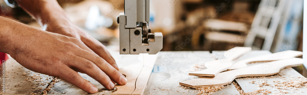 panoramic shot of carpenter using cnc machine panoramic shot of carpenter using cnc machine