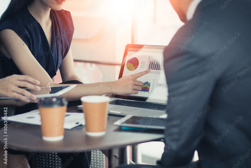 businessman and women working with tablet computer in office. business financial businessman and women working with tablet computer in office. business financial