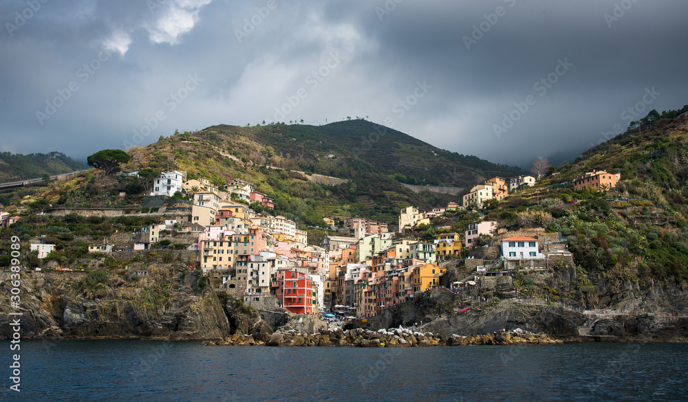 Village of Riomaggiore with colourful houses in Cinque Terre, Liguria, Italy