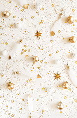 Christmas background. Xmas or new year gold white decorations on white background top view. holiday and celebration concept for postcard or invitation. 
