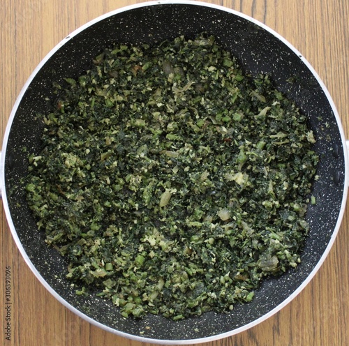 spinach in a bowl close up. Kerala food. Cheera thoran photo