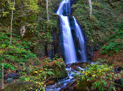 Oirase Stream in sunny day, beautiful fall foliage photo