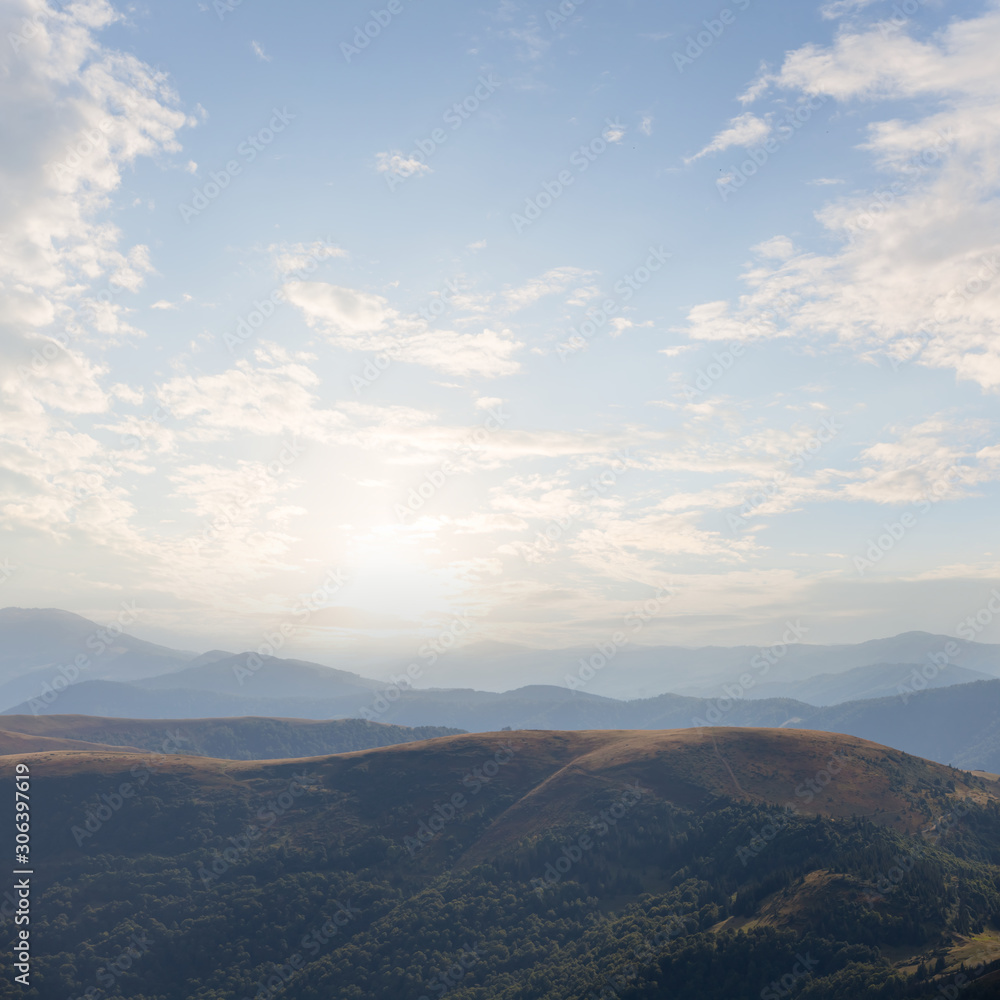 mountain ridge in a haze at the sunset