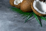 ripe chopped coconut on a gray stone background. place for your text
