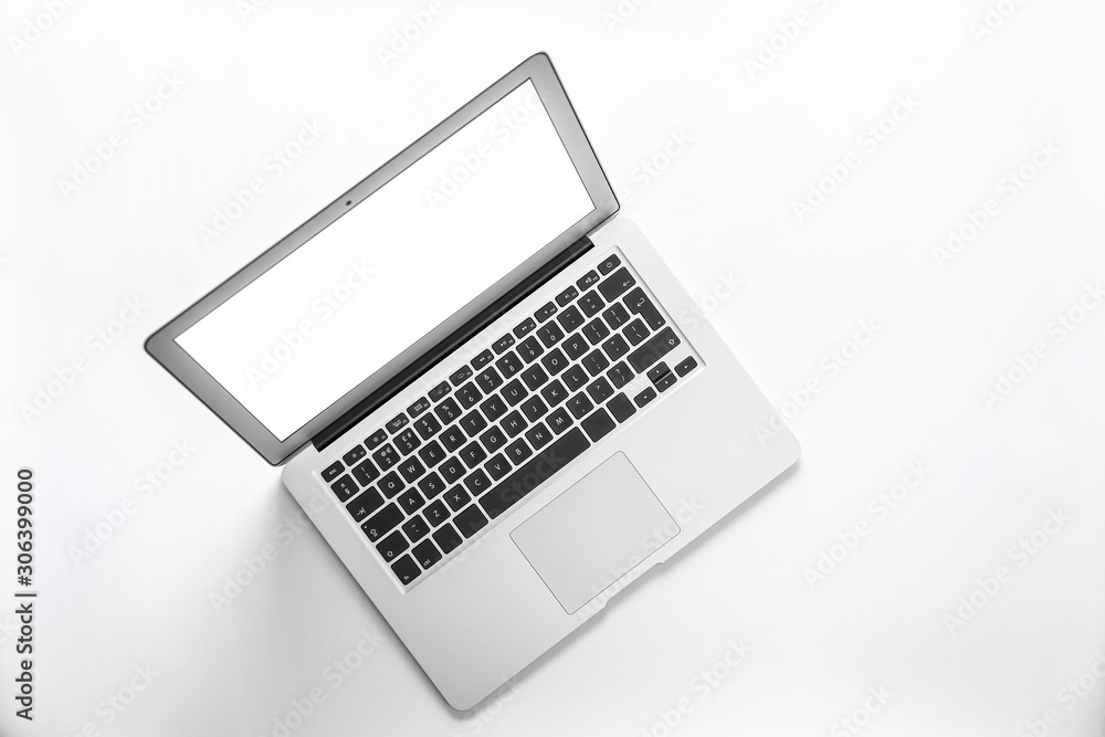 Modern laptop with blank screen isolated on white, top view Modern laptop with blank screen isolated on white, top view