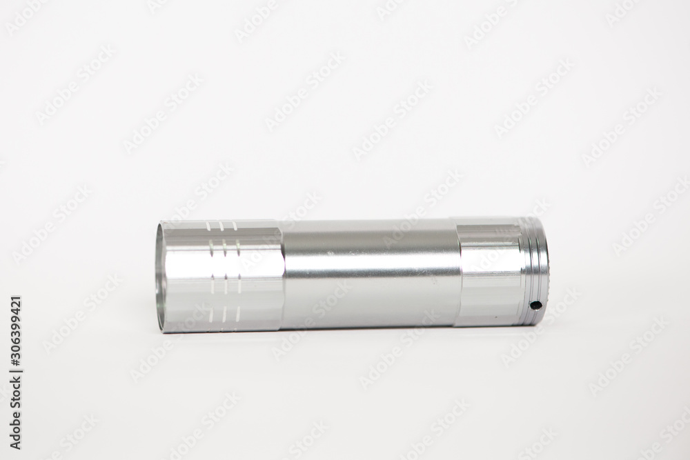 Aluminum flash light on white Aluminum flash light on white