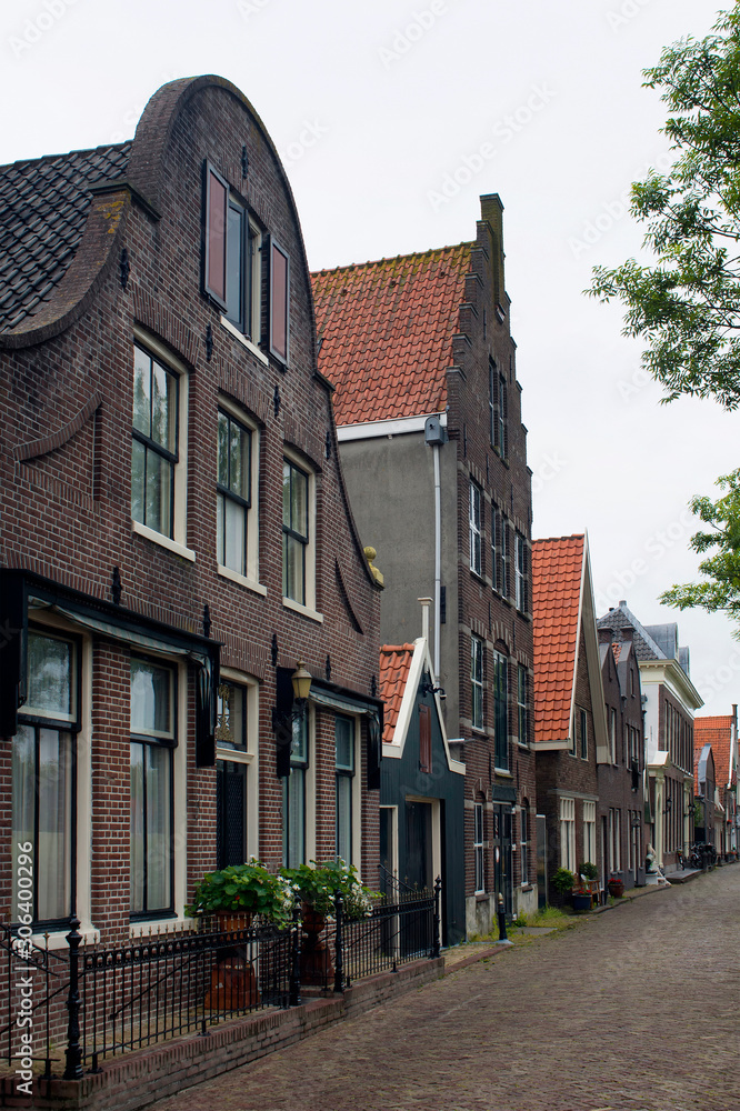 View of historical, traditional and typical houses in Edam. It is a town famous for its semi hard cheese in the northwest Netherlands, in the province of North Holland.