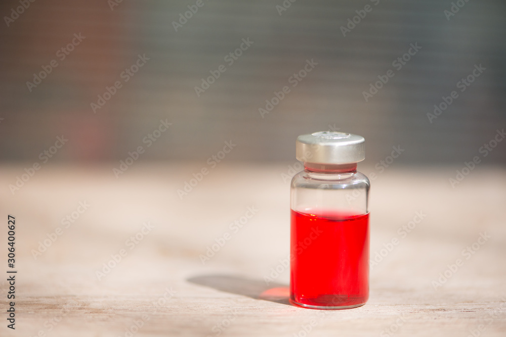 Injection vial show medical background Injection vial show medical background