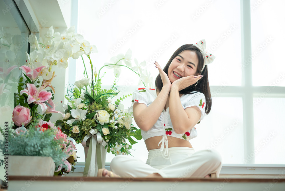 An Asian girl who is happy, attractive, and she is cute. An Asian girl who is happy, attractive, and she is cute.
