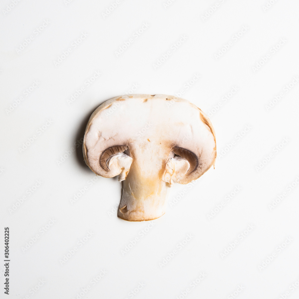 a slice of mushroom isolated on white background a slice of mushroom isolated on white background