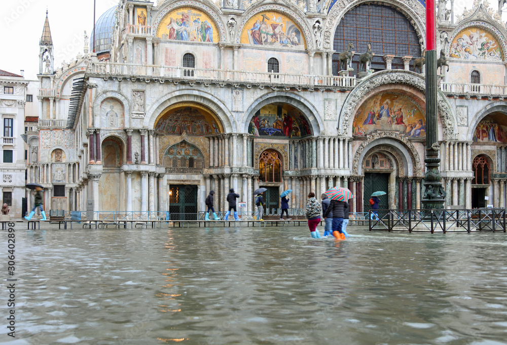 Basilica of Saint Mark in Venice in Italy with high tide and the