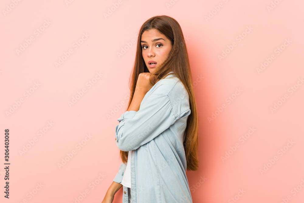 Young slim woman scared and afraid. Young slim woman scared and afraid.
