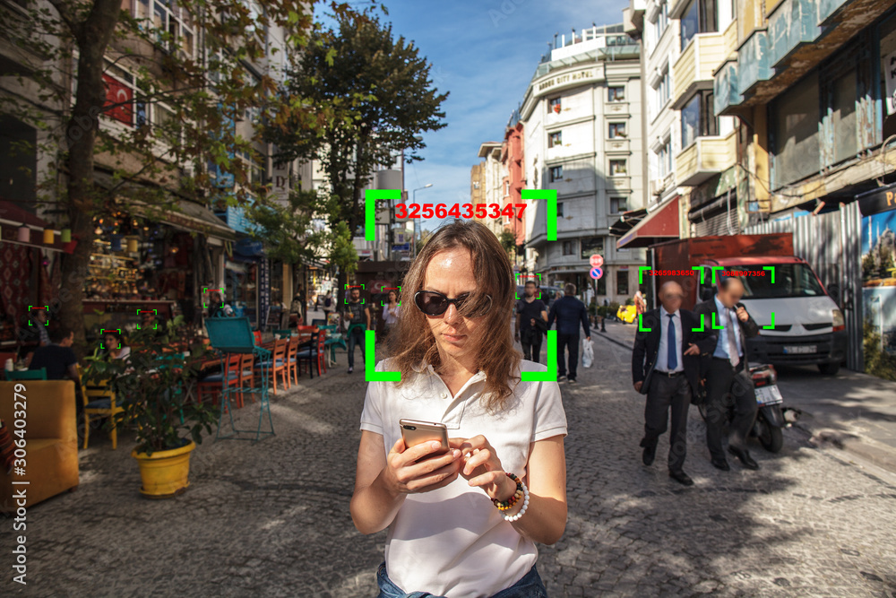 Conceptual photography - people walk on street, face recognition technology concept illustration of big data and security in city