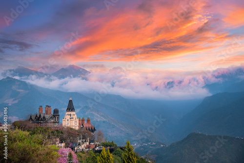 Landscape scenery view of Old England Manor with sunrise sky background, Near Cingjing Farm and Evergreen Grassland, Nantou County, Taiwan, photo