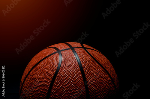 Basketball ball on black background.