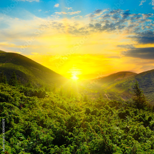 Beautiful mountains landscape. Sunset sky.