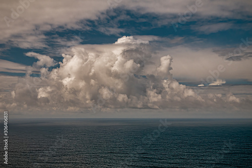 Atlantic ocean, cloudy sky.