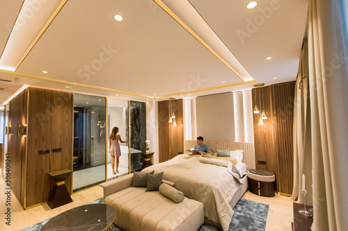 Relaxed young lovers in the luxurious apartment in the night © BGStock72