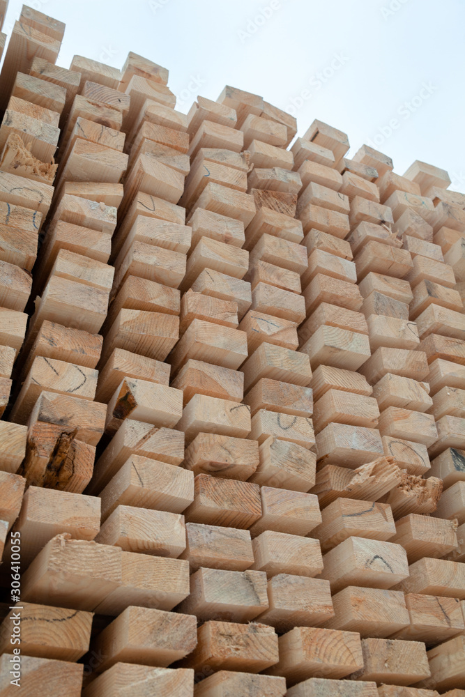 Wooden planks. Beams. Air-drying timber stack. Wooden planks. Beams. Air-drying timber stack.