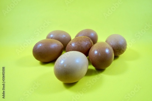 eggs isolated on yellow background