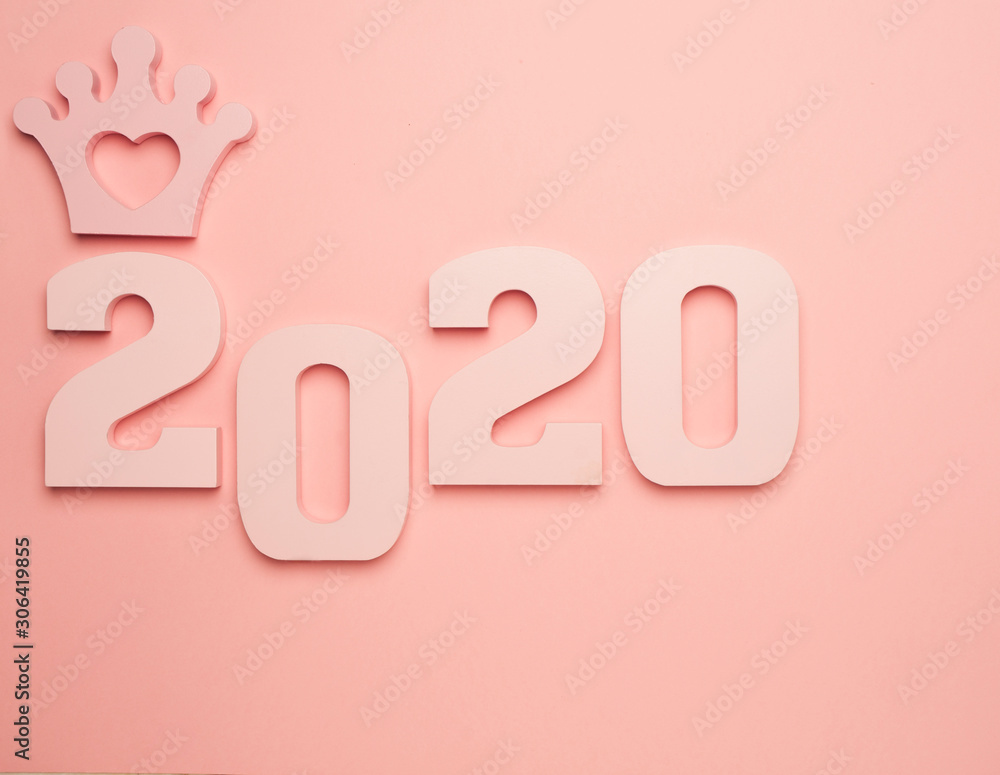 Creative inspiration concepts 2020 with text number and crown on the color background.Business resolution, action plan ideas.Pink color pale shades. Creative inspiration concepts 2020 with text number and crown on the color background.Business resolution, action plan ideas.Pink color pale shades.