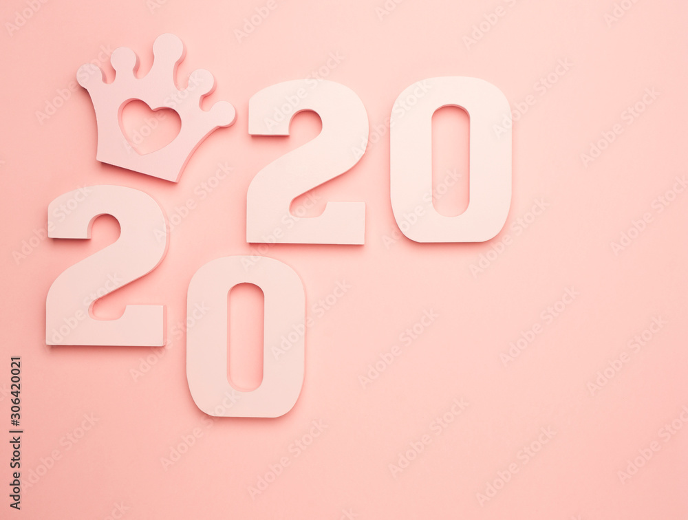 Creative inspiration concepts 2020 with text number and crown on the color background.Business resolution, action plan ideas.Pink color pale shades. Creative inspiration concepts 2020 with text number and crown on the color background.Business resolution, action plan ideas.Pink color pale shades.