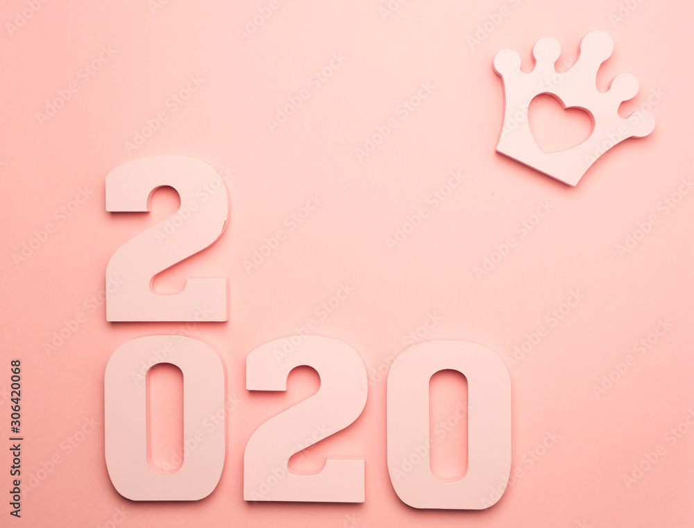 Creative inspiration concepts 2020 with text number and crown on the color background.Business resolution, action plan ideas.Pink color pale shades. Creative inspiration concepts 2020 with text number and crown on the color background.Business resolution, action plan ideas.Pink color pale shades.