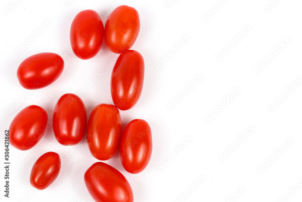 Red, juicy, delicious plum tomatoes. Tomatoes on a white background. Text space. Red, juicy, delicious plum tomatoes. Tomatoes on a white background. Text space.
