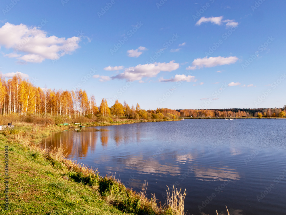 colorful autumn landscape by the lake, golden autumn, colorful trees and reflections