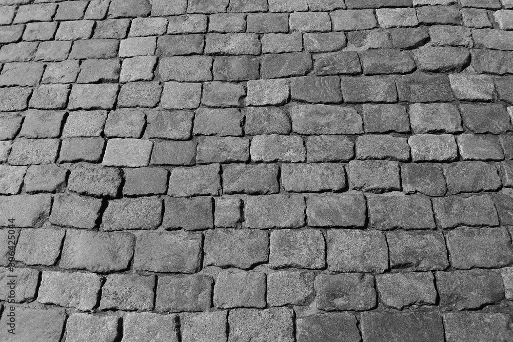 cobblestone pavement close-up in black and white