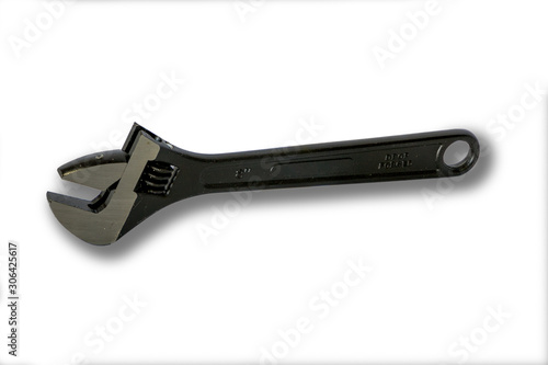 фотографія Black adjustable wrench. Hand tools isolated on white background