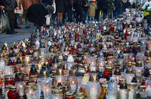 Wallpaper Mural Monument and candles in the cemetery. All Saints Day in Poland. A lot of funeral candles. Torontodigital.ca