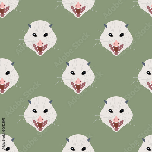 Seamless geometrical animal pattern with stylized funny faces of opossum photo