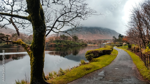 Kylemore Lough lake in Connemara, Ireland. Lake reflections in autumn at the foot of Doughruagh mountain.