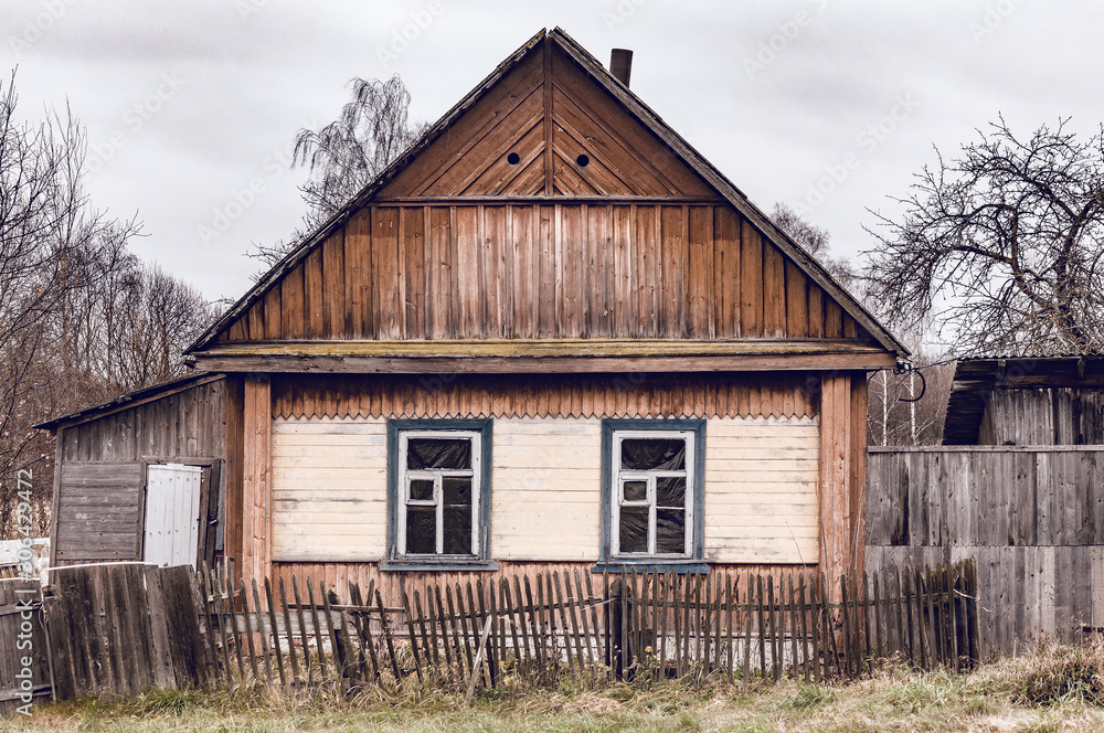 Abandoned ancient wooden house ar cloudy day time. Abandoned ancient wooden house ar cloudy day time.