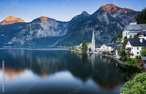 Beautiful shot of the Bad Goisern town in Austria near the lake during the sunset photo