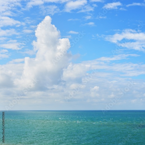 Fotografie, Obraz View of Strait of Dover (Pas de Calais) with peaceful clouds on a sunny day
