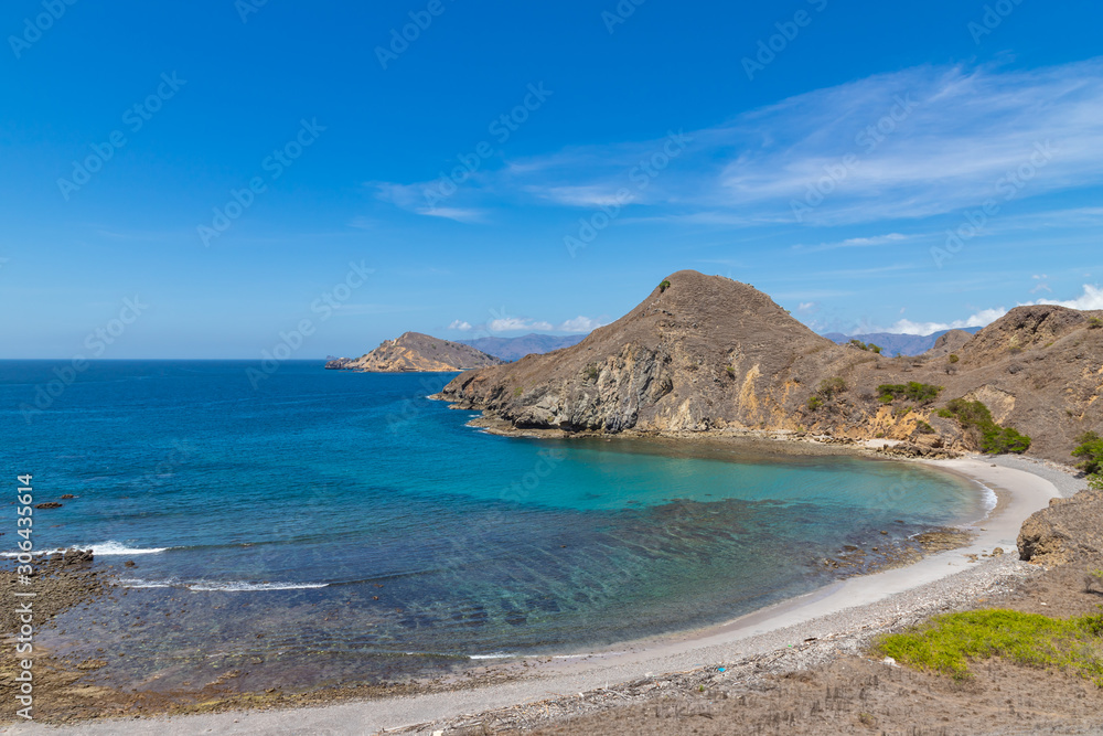 Obraz premium Landscape view at Padar island bay with crystal clear water in Komodo islands, Flores, Indonesia.