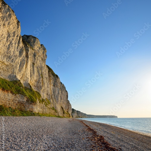 White cliffs on the beach of Fecamp, France photo