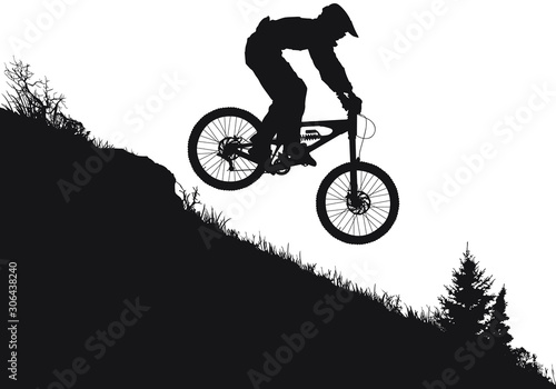  A vector silhouette of an extreeme downhill mountain biker photo