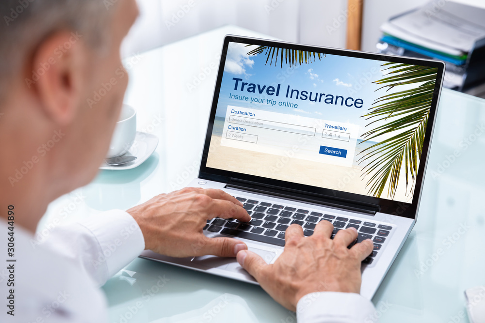 Businessman Videoconferencing With Colleague On Laptop