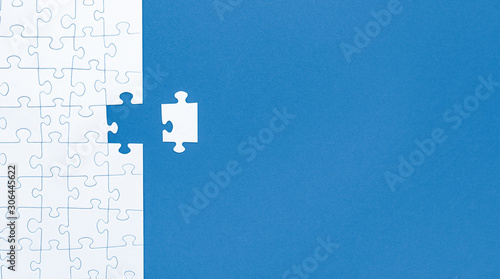 Business concept of white jigsaw puzzle.