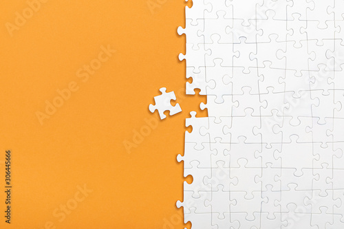 Business concept of white jigsaw puzzle. photo