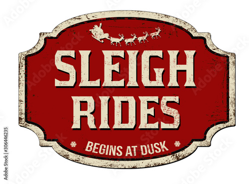 Sleigh rides vintage rusty metal sign