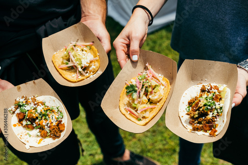 people eating tacos