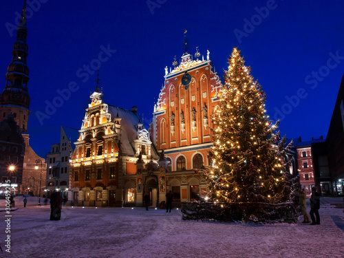 Blackhead House and Christmas Tree at night in the capital of Latvia Riga in winter 
